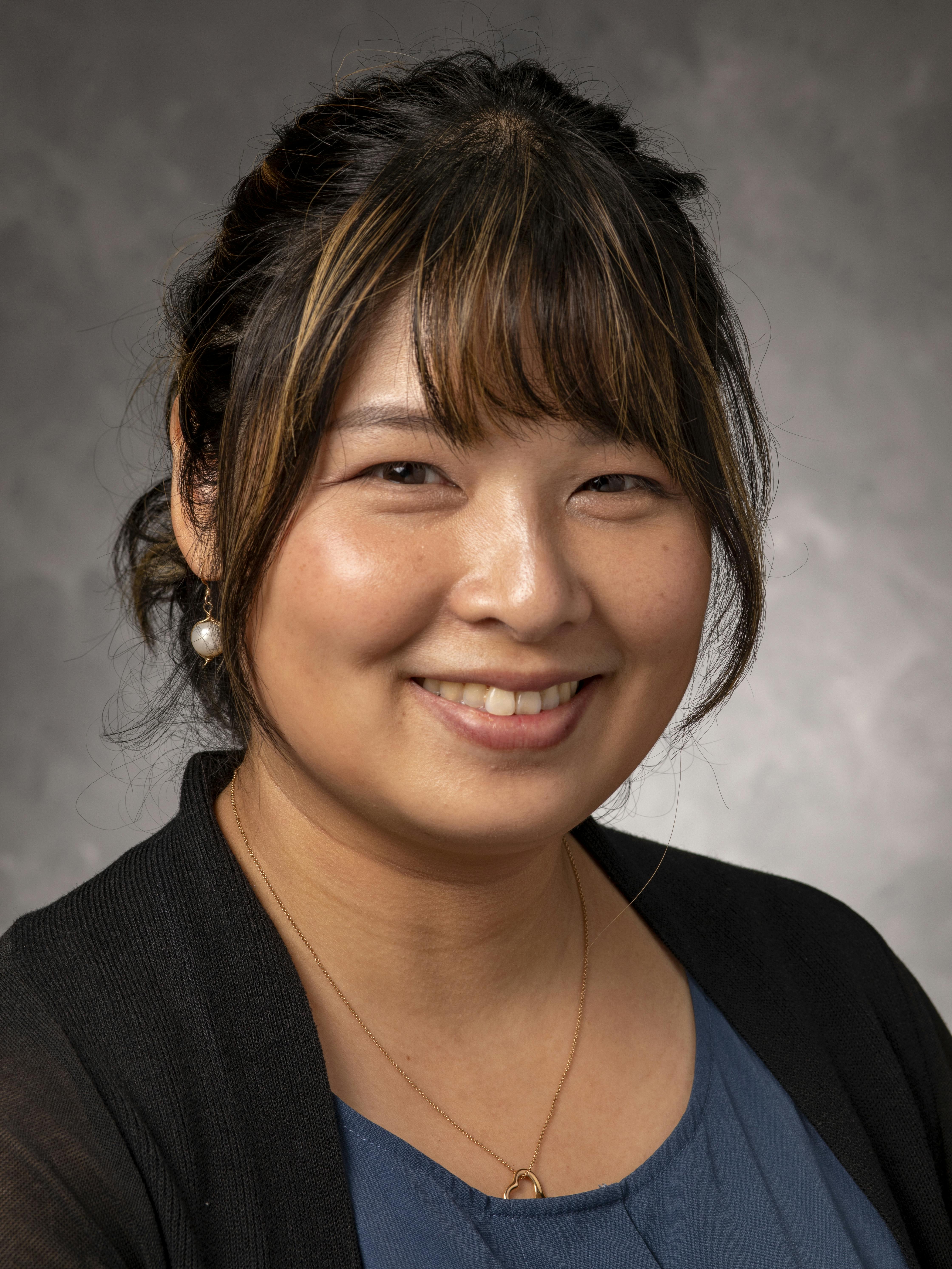 Ai-Chu Elisha Ding headshot