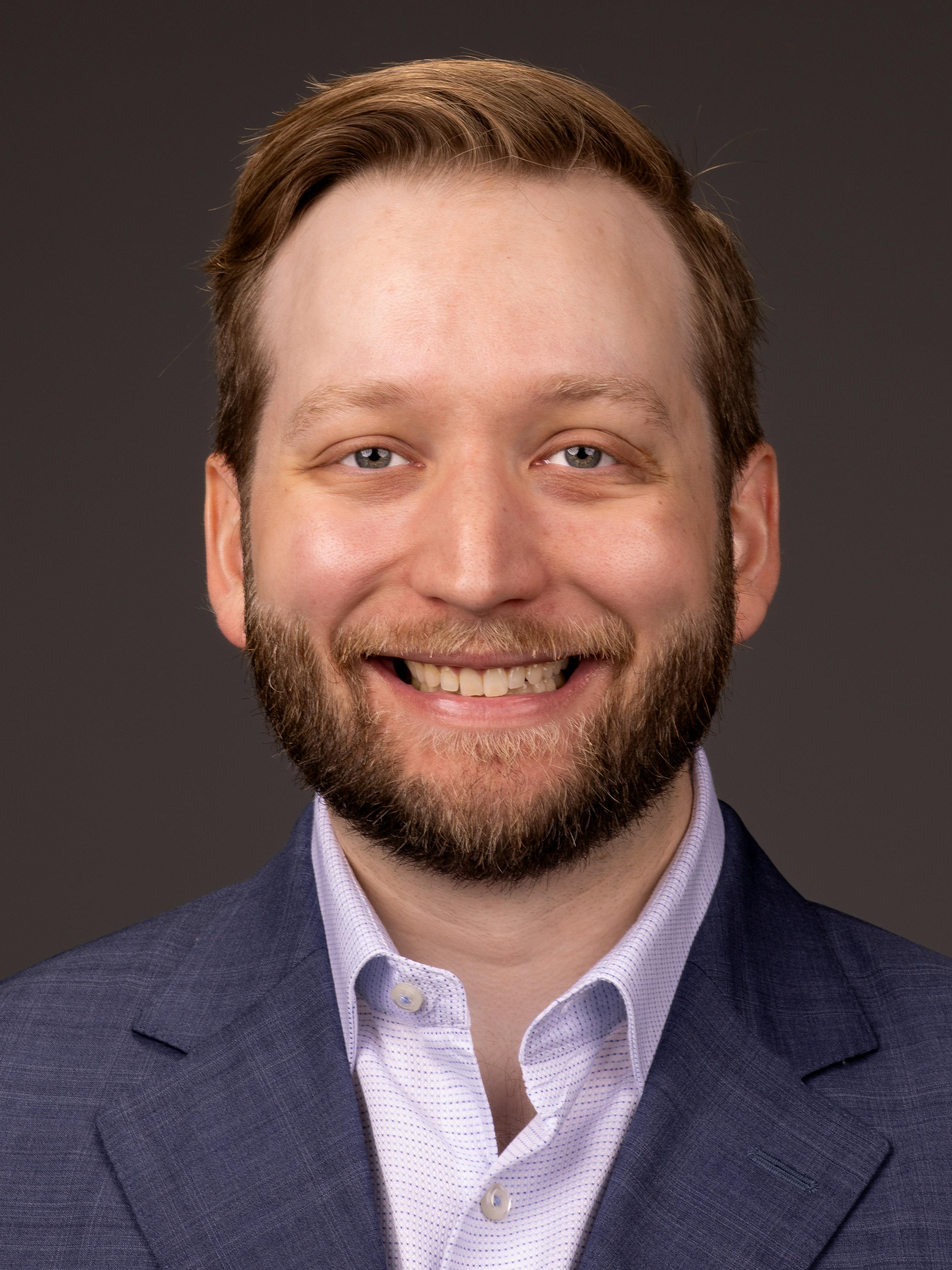 John D. Akins headshot